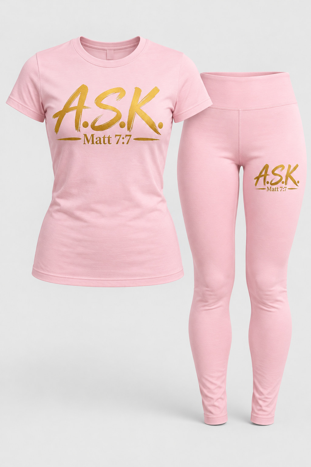 A matching light pink women's two-piece set — a pink short-sleeve tee and matching pink leggings, each carrying the gold A.S.K. Matt 7:7 mark printed into the fabric